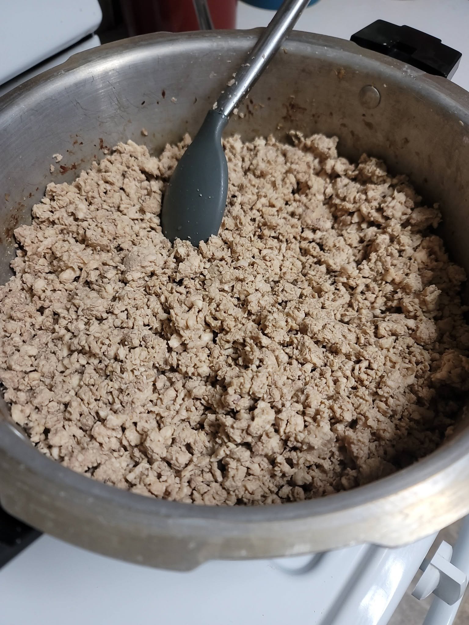 Ground chicken in a cooking pot