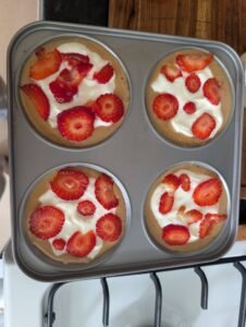 Peanut butter and yogurt treats topped with sliced strawberries