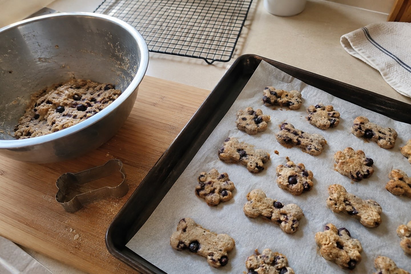 Preparing baked salmon blueberry dog biscuits