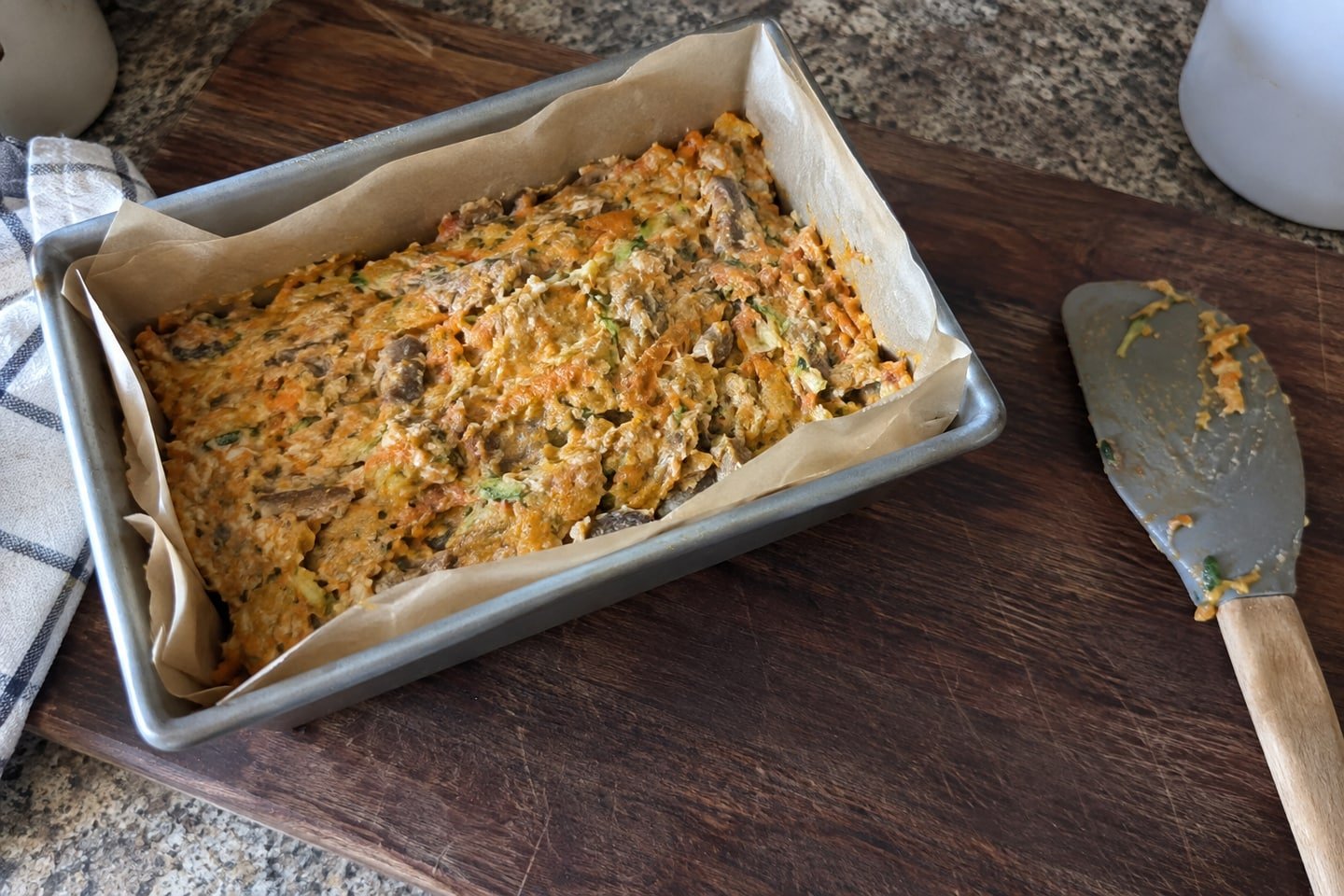 Preparing sardine and sweet potato loaf for dogs