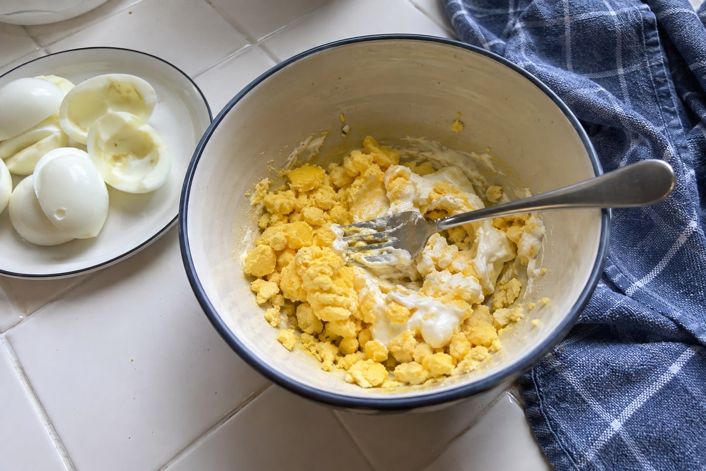 Preparing yogurt-filled egg bites for dogs